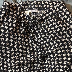 RED Valentino black tie waist bow print pants